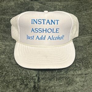 ISSI White Mesh Back Trucker Cap with Blue Tag